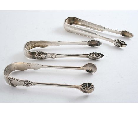 THREE PAIRS OF SCOTTISH SUGAR TONGS:- A provincial pair with fluted bowls, crested, by Robert Keay of Perth, a King's pattern