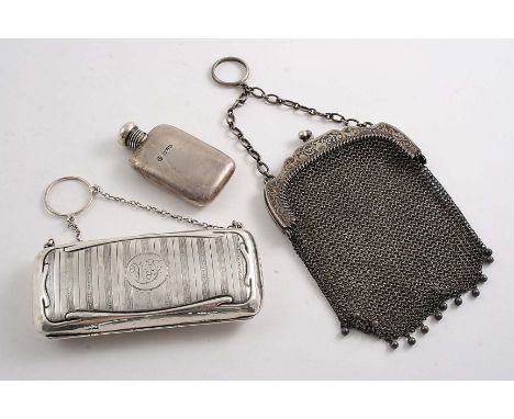 A CHAIN MESH PURSE with English import marks for 1901, an engine-turned purse with green satin lining, initialled "W&F", by C