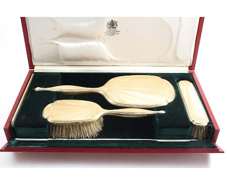 A 20TH CENTURY CASED THREE-PIECE SILVERGILT & ENAMELLED DRESSING TABLE SET by Barker Brothers, Birmimgham 1938 (the box also 