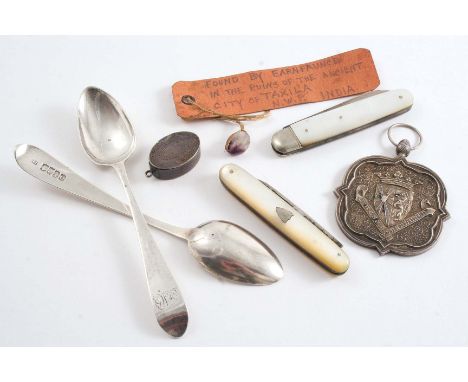 A MIXED LOT:- Two folding fruit knives with mother of pearl pallettes, a pair of George III Irish tea spoons, initialled, a s