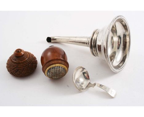 A 19TH CENTURY TURNED COQUILLA-NUT NUTMEG GRATER in the shape of an acorn, a George III caddy spoon, initialled and an Old Sh