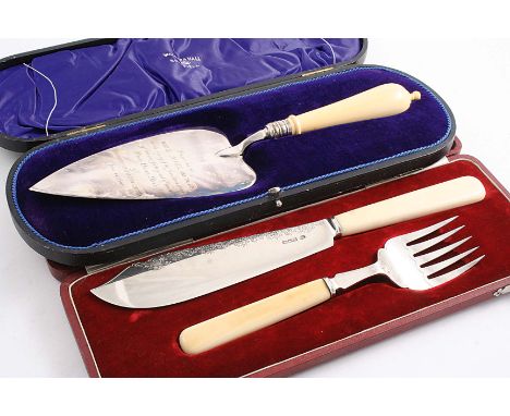 A CASED PAIR OF EARLY 20TH CENTURY FISH SERVERS with engraved detail & ivory handles, by the Alexander Clark Co.Ltd., Sheffie