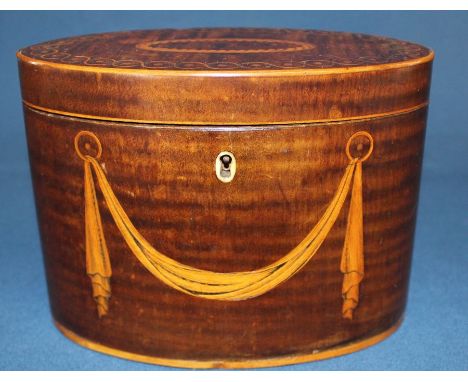 George III oval mahogany tea caddy with inlaid swag to front and geometric inlay to lid, ivory escutcheon &amp; retaining ori