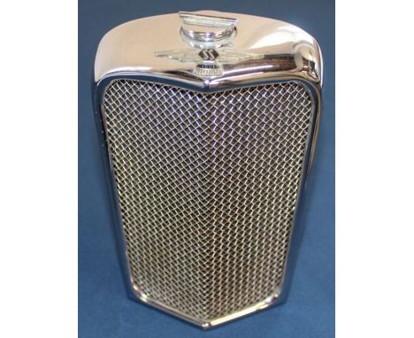 A Ruddspeed chromium plated spirit decanter or flask modelled as a classic vintage Jaguar car radiator, with radiator cap sty