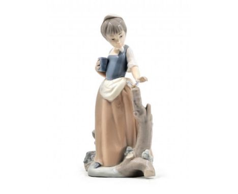 'Girl with a butterfly' - porcelain figure by Nao (Nao by Lladro), Spanish porcelain, signed, Height: 22 Width: 13  Period: 2