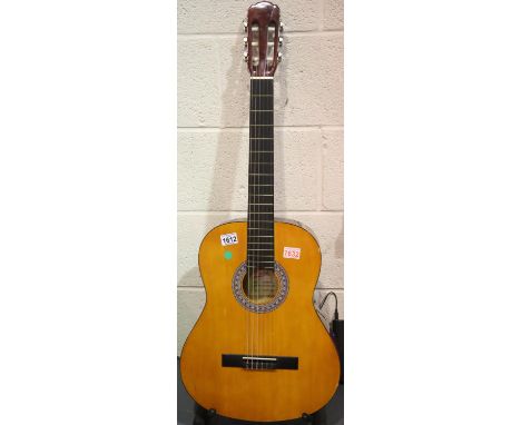 Freedom CG300 classical acoustic guitar. P&amp;P Group 3 (£25+VAT for the first lot and £5+VAT for subsequent lots)
Condition