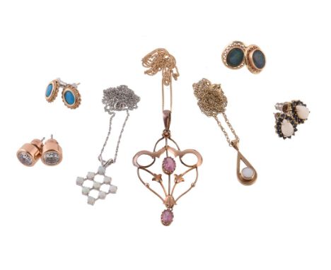 
	
		A small collection of jewellery, to include an early 20th century pink doublet pendant, with scrolled whiplash motif and