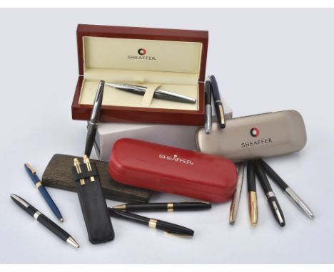 
	
		A collection of Sheaffer pens, to include: Sheaffer, Legacy, a black fountain pen, the cap with white metal clip and cap