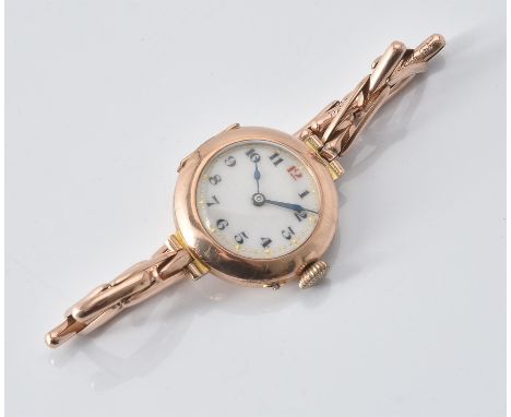 
	
		Unsigned,
		Lady's 9 carat gold bracelet watch, circa 1915
		Movement: Manual wind
		Case: 9 carat gold case, hinged sna