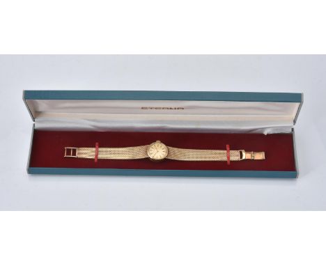 
	
		Eterna,
		Lady's 9 carat gold bracelet watch, circa 1967
		Movement: Manual wind
		Case: Gold coloured case, snap case b