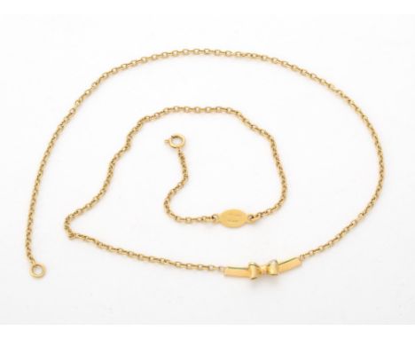 
	
		A bow necklace, the curved front panel with green enamel and bow detail, with a brilliant cut diamond accent, to a belch