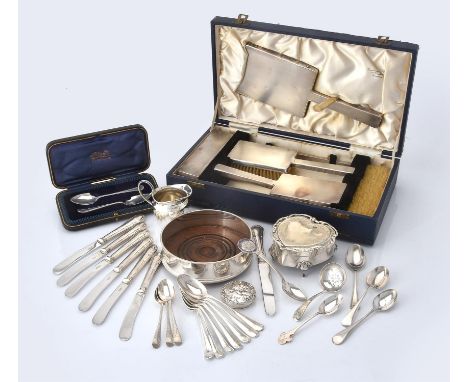 
	
		A collection of silver and silver mounted items, to include: a cased six piece silver mounted dressing table set by Padg