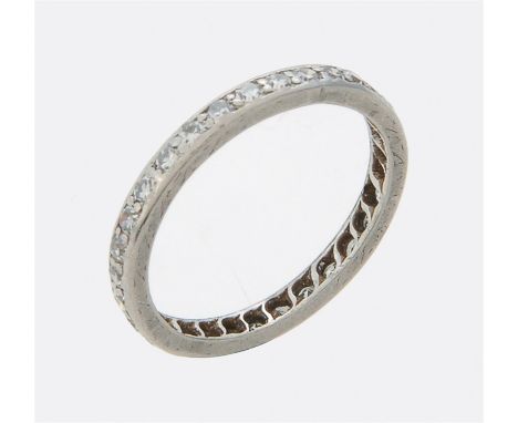 
	
		A first half of the 20th century diamond eternity ring, set with eight cut diamonds, approximately 0.60carats total, fin