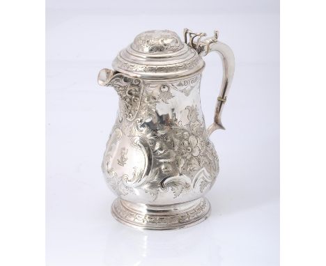 
	
		Y&nbsp;An electro-plated baluster jug and cover, with an ogee domed cover, a double scroll handle with ivory warming ban