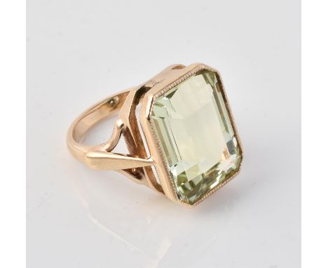 
	
		A 9 carat gold aquamarine ring, the rectangular cut aquamarine in a collet setting, stamped 375 with full Birmingham hal