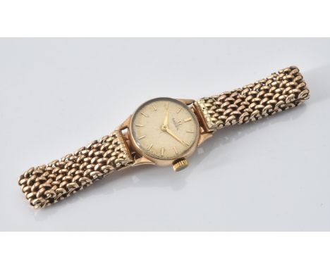 
	
		Omega, 
		Lady's 9 carat gold bracelet watch, circa 1959
		Movement: Manual wind, 15 jewels
		Case: 9 carat gold case, s