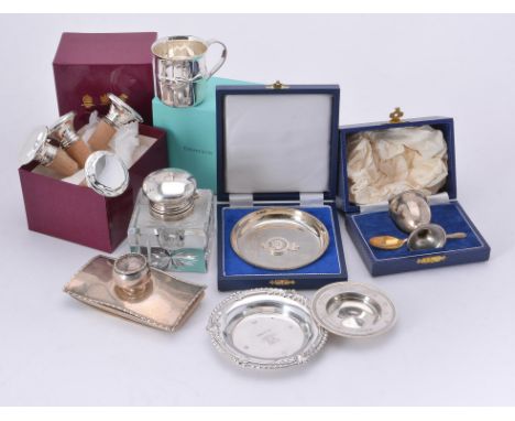 
	
		A collection of silver and silver mounted items, to include: a silver Christening mug by Tiffany &amp; Co., with a scrol