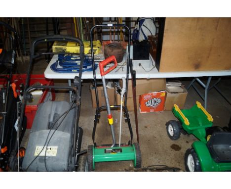 A Powerbase hand push cylinder mower together with various tools