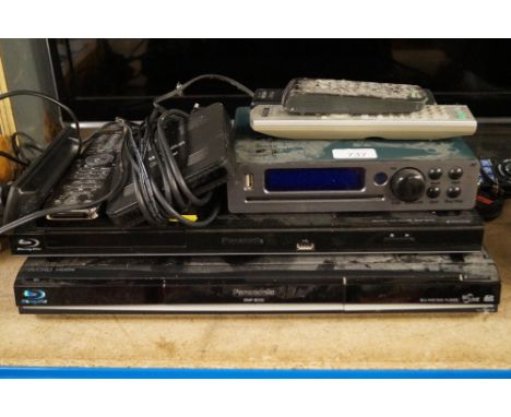 A Panasonic Blu-ray disc player, another Panasonic Blu-ray player, JB7 CD player and a Free sat box 