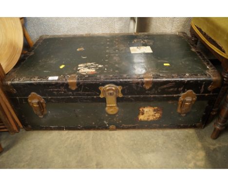 A metal bound travelling trunk 