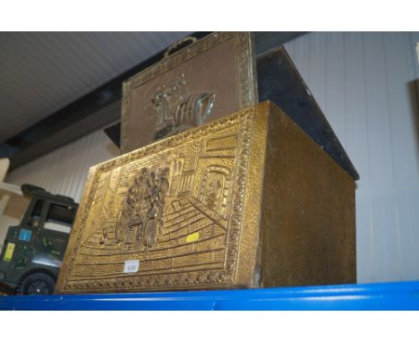 A brass embossed coal box and a similar fire screen