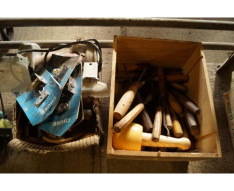 A bench grinder, iron solders collectors item, a box containing wooden mallets and a quantity of chisels stamped E.C Blake