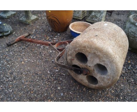 A cast iron and concrete garden roller