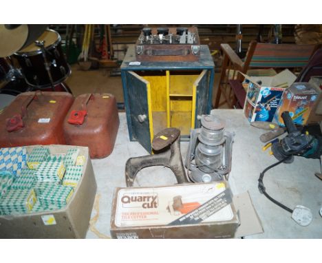 A Galvano meter together with a wooden storage box, Tilley lamp, shoe last and a tile cutter