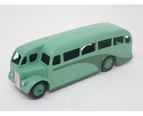 A Dinky Toys No.29E green single decker Bus, mint. Model in green with green hubs in mint condition. Ideal scale for the layo