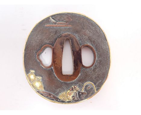 A pair of 19th Century British Army brass shoulder Epaulettes and a Japanese sword Tsuba