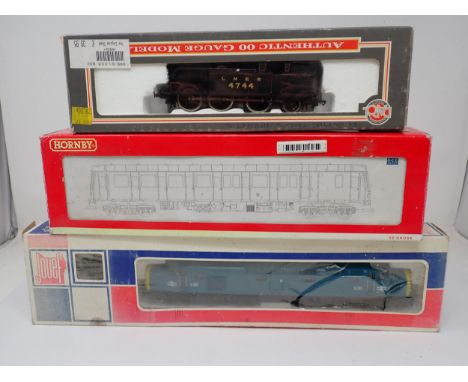 A boxed Hornby 00 gauge Chiltern Railways Class 121 Driving Motor Brake, a boxed Jouef Class 40 diesel Locomotive and a boxed