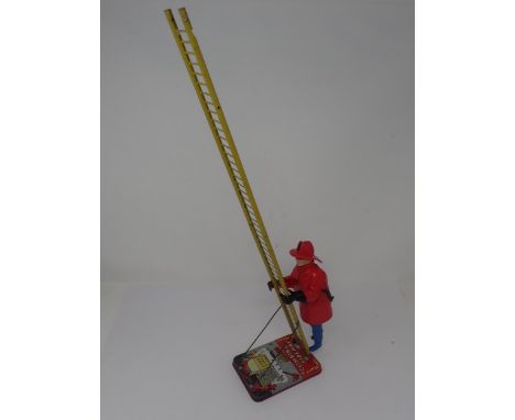 An unboxed Marx tinplate 'The Climbing Fireman' 