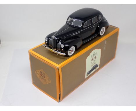 A boxed Weimanhuanghou 1:18 scale Car 