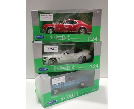 Three boxed Nex Models by Welly 1:24 Models including Chevrolet Camaro, Oldsmobile and Mercedes-Benz SL500 