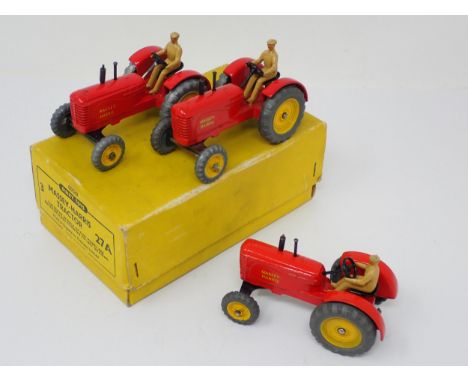 A Dinky Toys No.27A Massey-Harris Tractor full Trade Box 