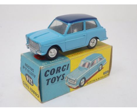 A boxed Corgi Toys No.216 two tone blue Austin A40 Saloon with dished hubs 