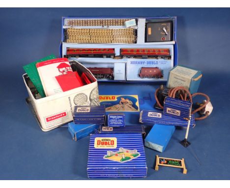 A Hornby-Dublo 'Duchess of Atholl' Passenger Set, box lid damaged, a quantity of boxed 3-rail Track and a Bayko Kit 