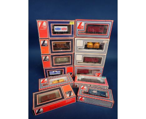 Twelve boxed Lima and Life-Like Trains 00 gauge Wagons 