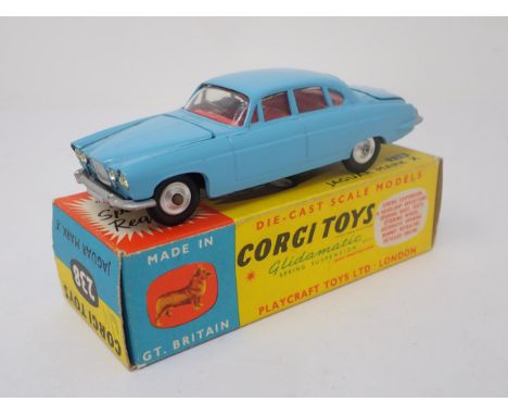 A boxed Corgi Toys No.238 light blue Jaguar Mark 10 with luggage 