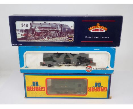 A boxed Bachmann 00 gauge 5MT Class Locomotive in B.R. green livery, a boxed Graham Farish 00 gauge 0-6-0 Pannier Tank in G.W