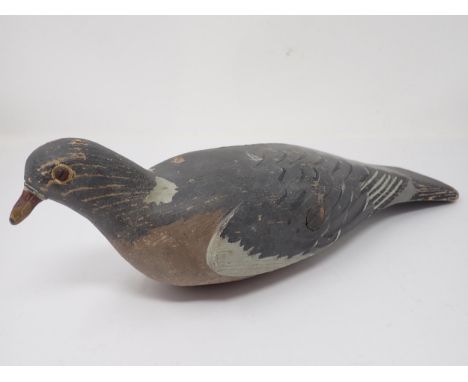 A vintage carved and painted Woodpigeon Decoy by Harry Boddy 14in L 