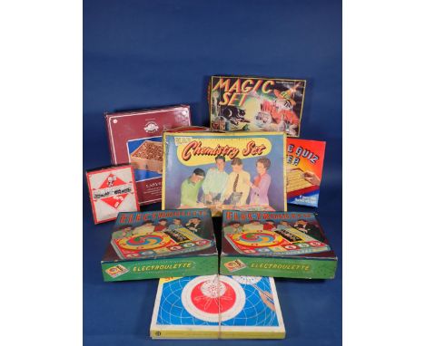 A box of Games including Kay Chemistry Set, two sets of Electroroulette, Magic Set, etc. 
