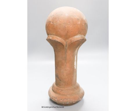   A terracotta finial, height 38cm