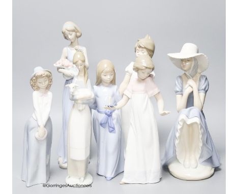   Six Nao porcelain figures and a Lladro figure (7)