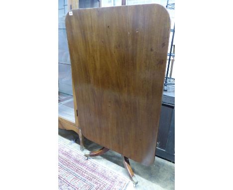   A Regency rectangular mahogany tilt top dining table, on downswept tripod base, W.119cm D.82cm H.73cm