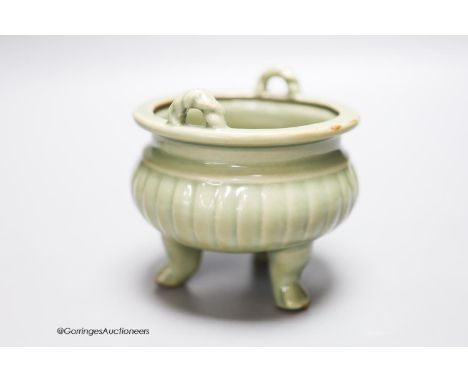   A Chinese celadon tripod censer, height 11.5cm