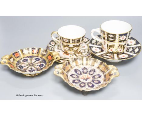   A quantity of Royal Crown Derby cups, plates and dishes