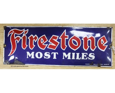   A Firestone Most Miles enamel sign, 15 x 40cm