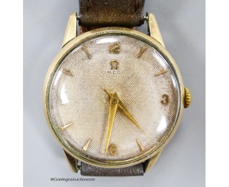   A gentleman's early 1950's gold plated Omega manual wind wrist watch, movement c.283, on associated strap.