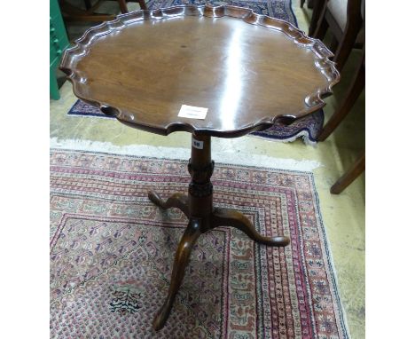   A George III and later mahogany tripod wine table, with piecrust top, Diam.50cm H.65cm